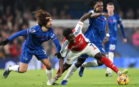 Merino bails out Arsenal as 10 men Chelsea push leaders to the brink at Stamford Bridge