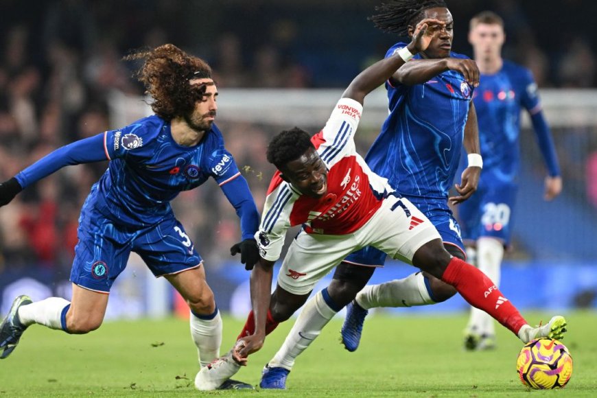 Merino bails out Arsenal as 10 men Chelsea push leaders to the brink at Stamford Bridge